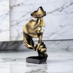Picture of Handcrafted Silence Is Gold Thinker Statue – Modern Abstract Resin Figurine for Home & Office Decor